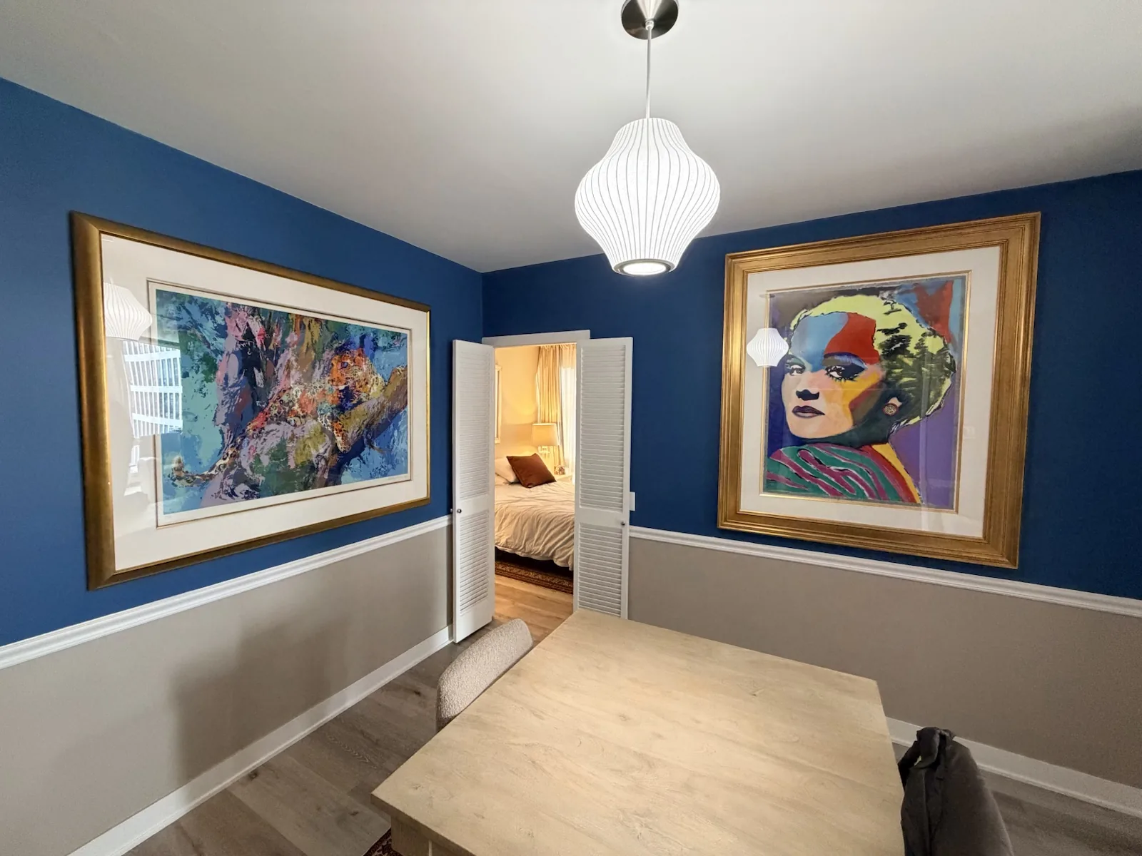 Framed artwork installation with precise placement and alignment
