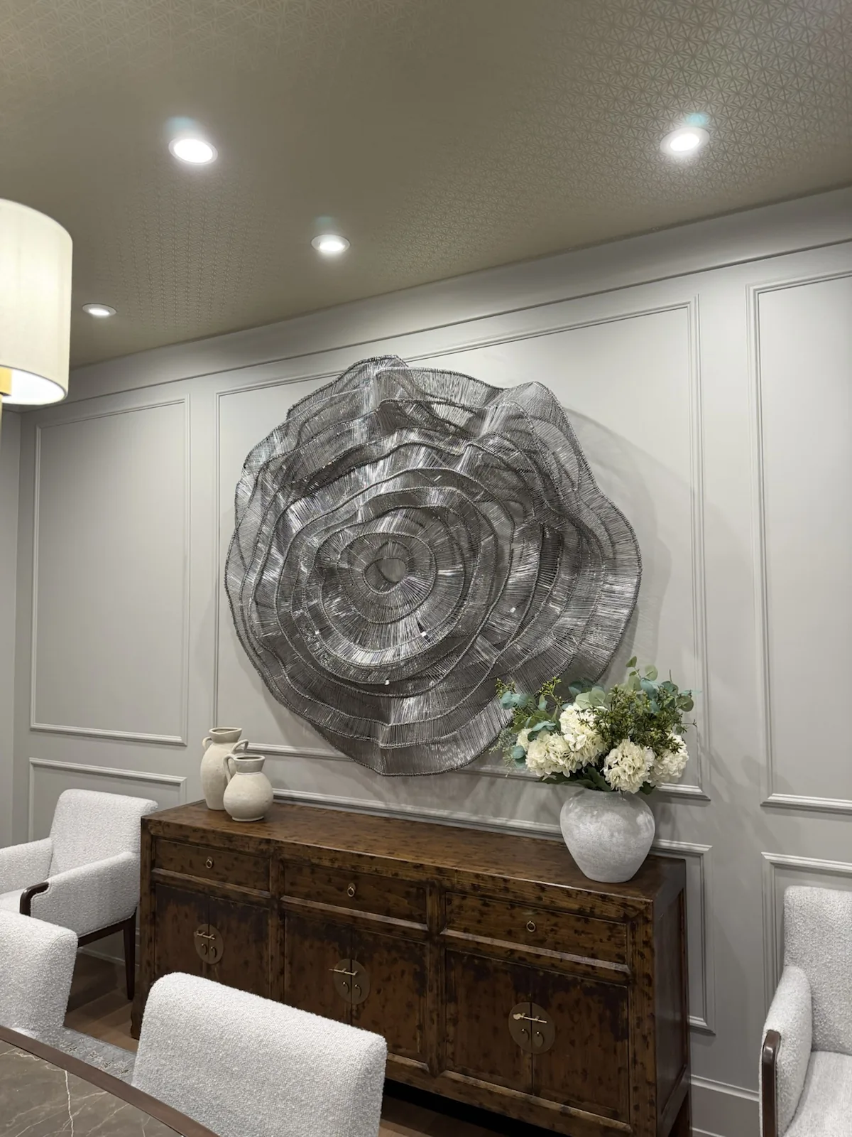 Large sculptural wall art installation in a high-end interior