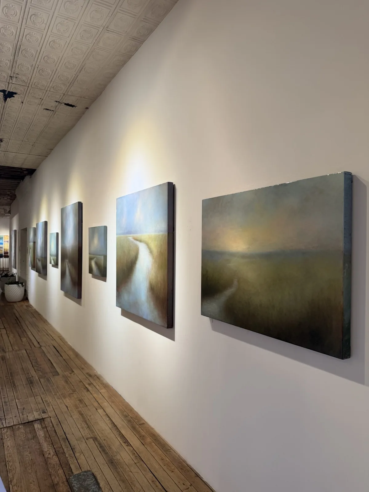 Designer-directed artwork placement and installation