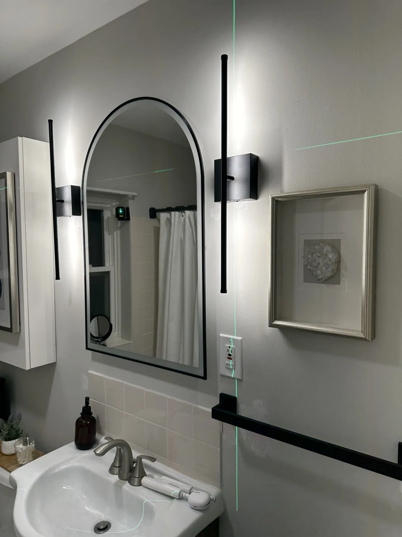 Completed mirror installation by ORLEG Mounting Services