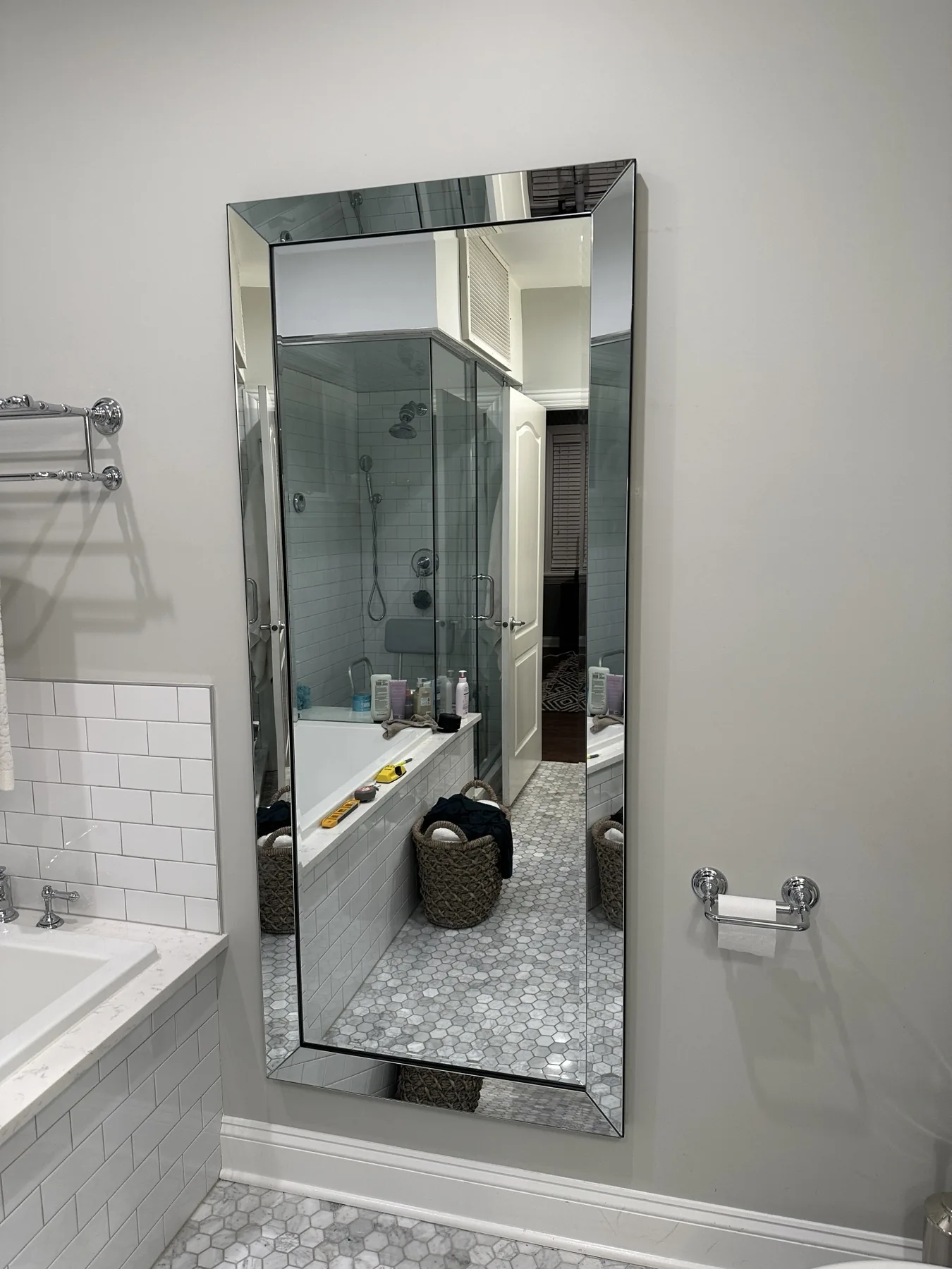 Completed mirror installation by ORLEG Mounting Services
