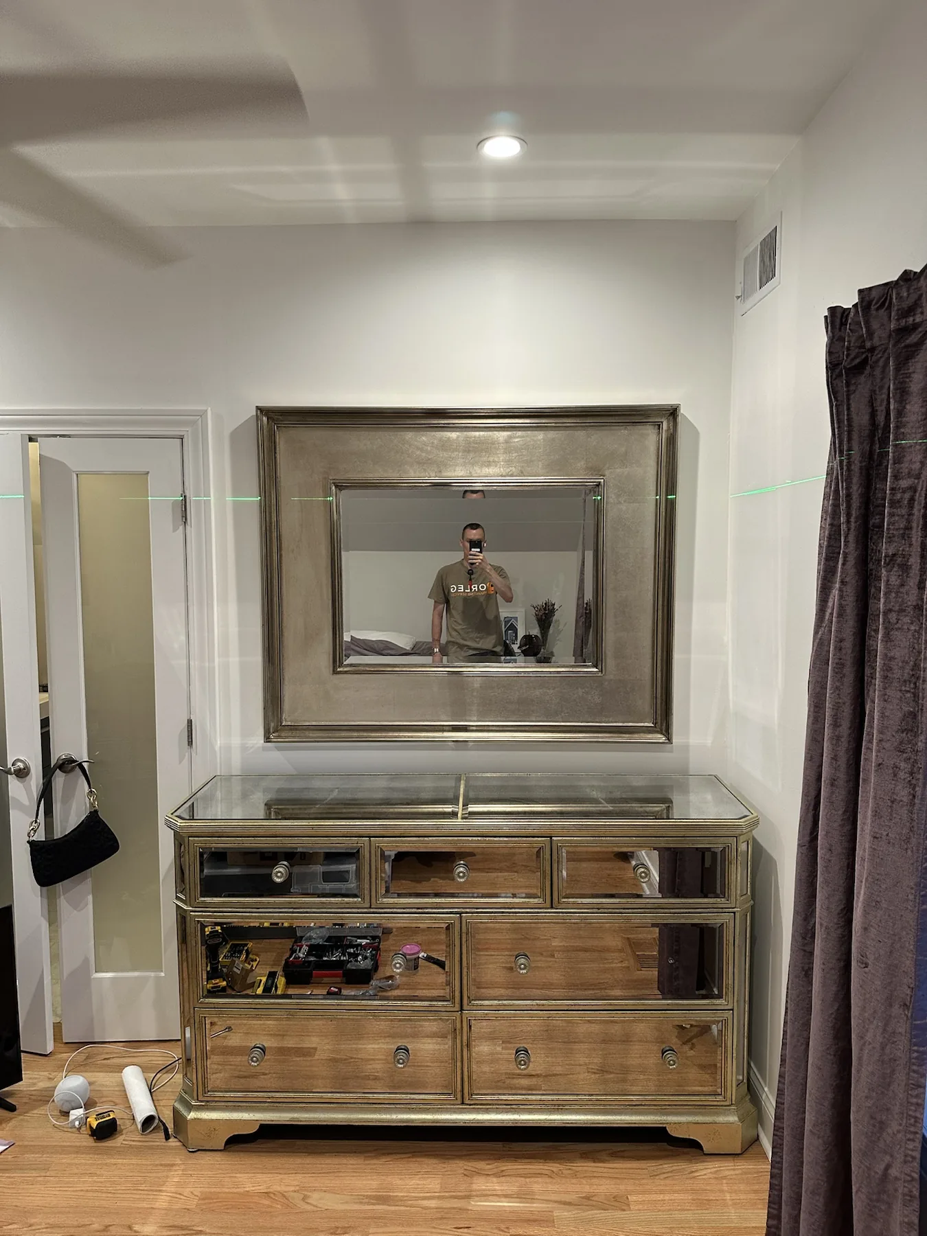 Completed mirror installation by ORLEG Mounting Services