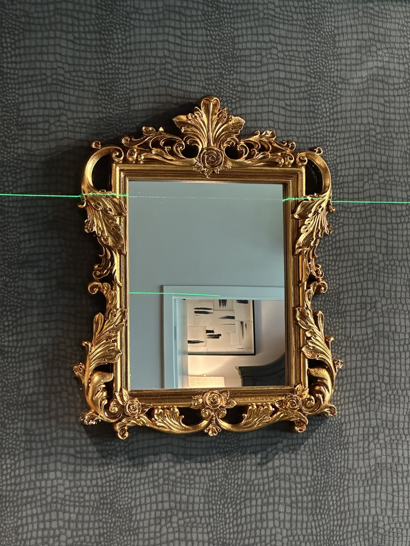 Completed mirror installation by ORLEG Mounting Services