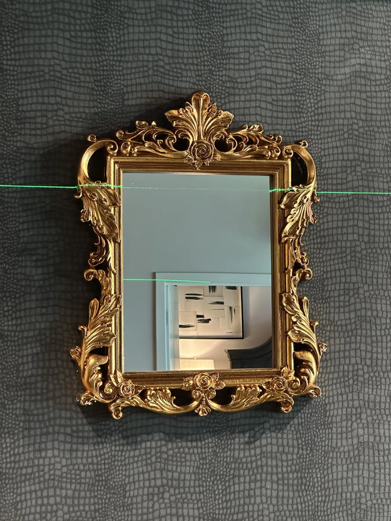 Completed mirror installation by ORLEG Mounting Services