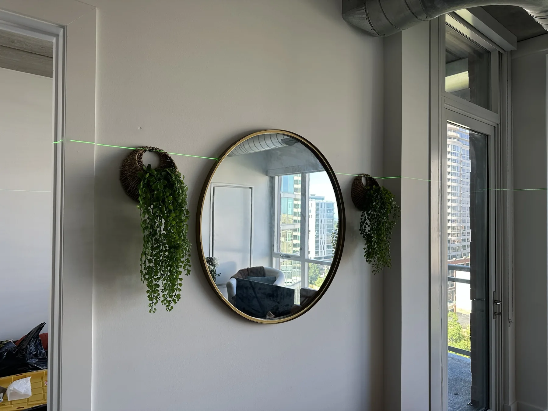 Completed mirror installation by ORLEG Mounting Services