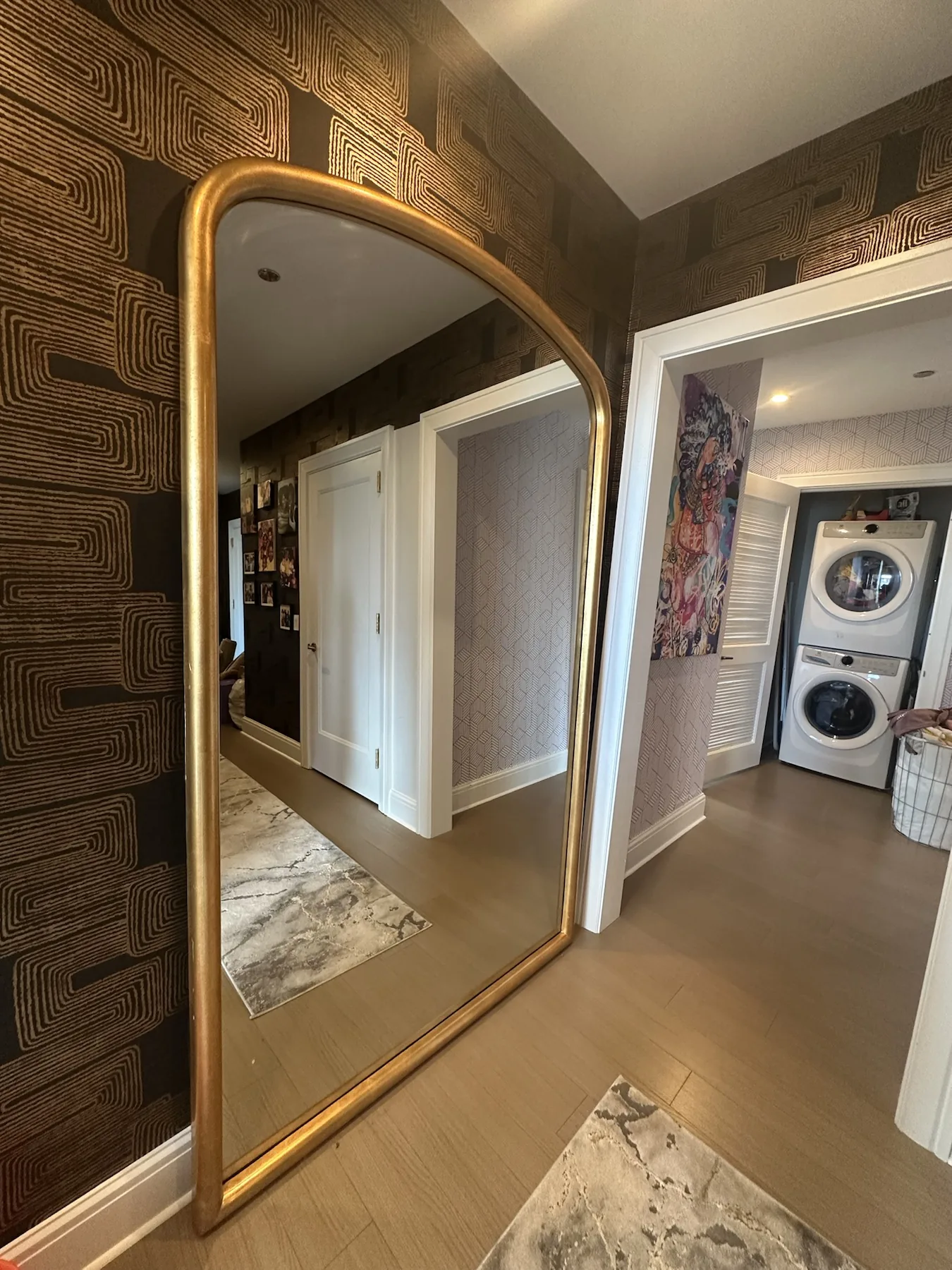 Completed mirror installation by ORLEG Mounting Services