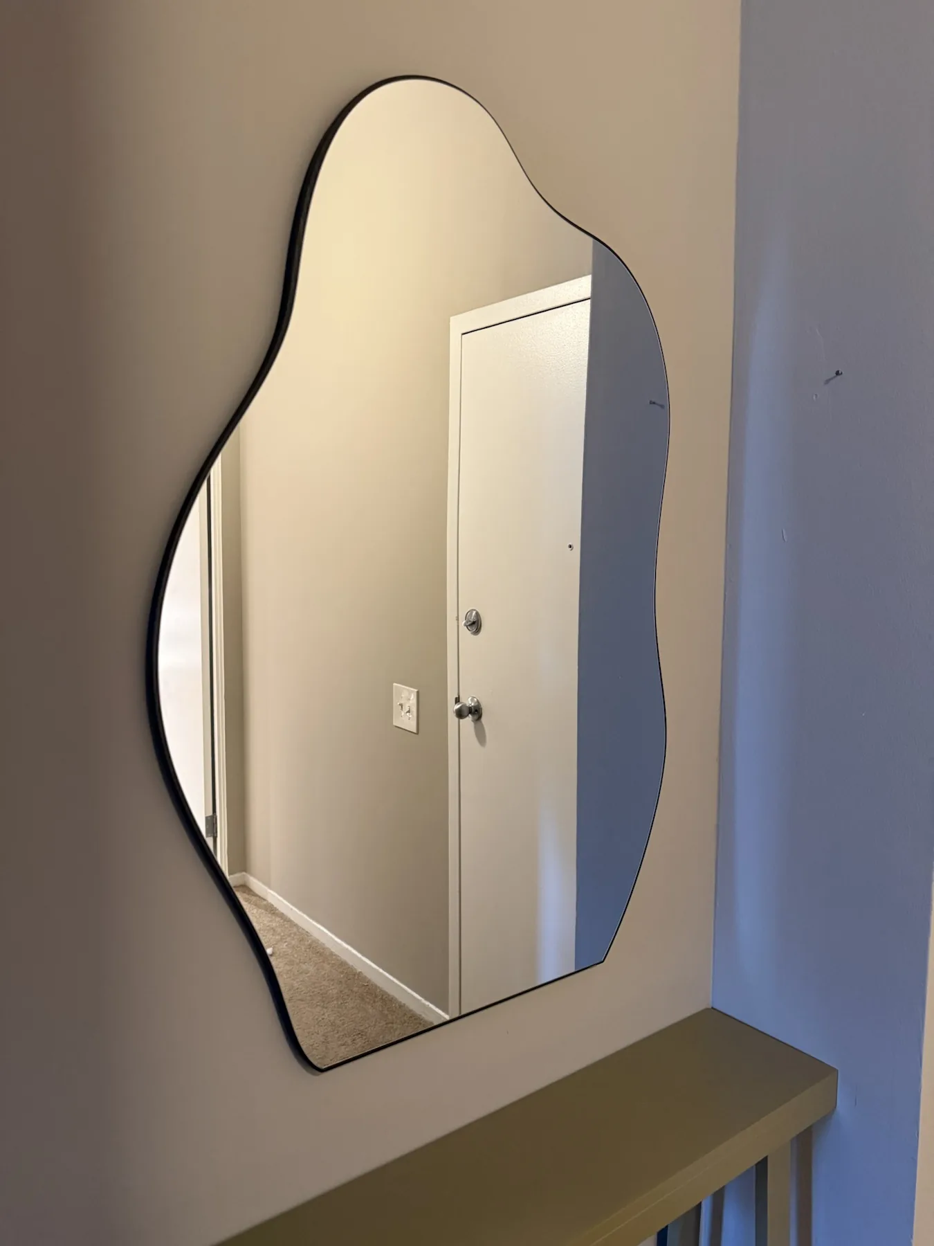 Completed mirror installation by ORLEG Mounting Services