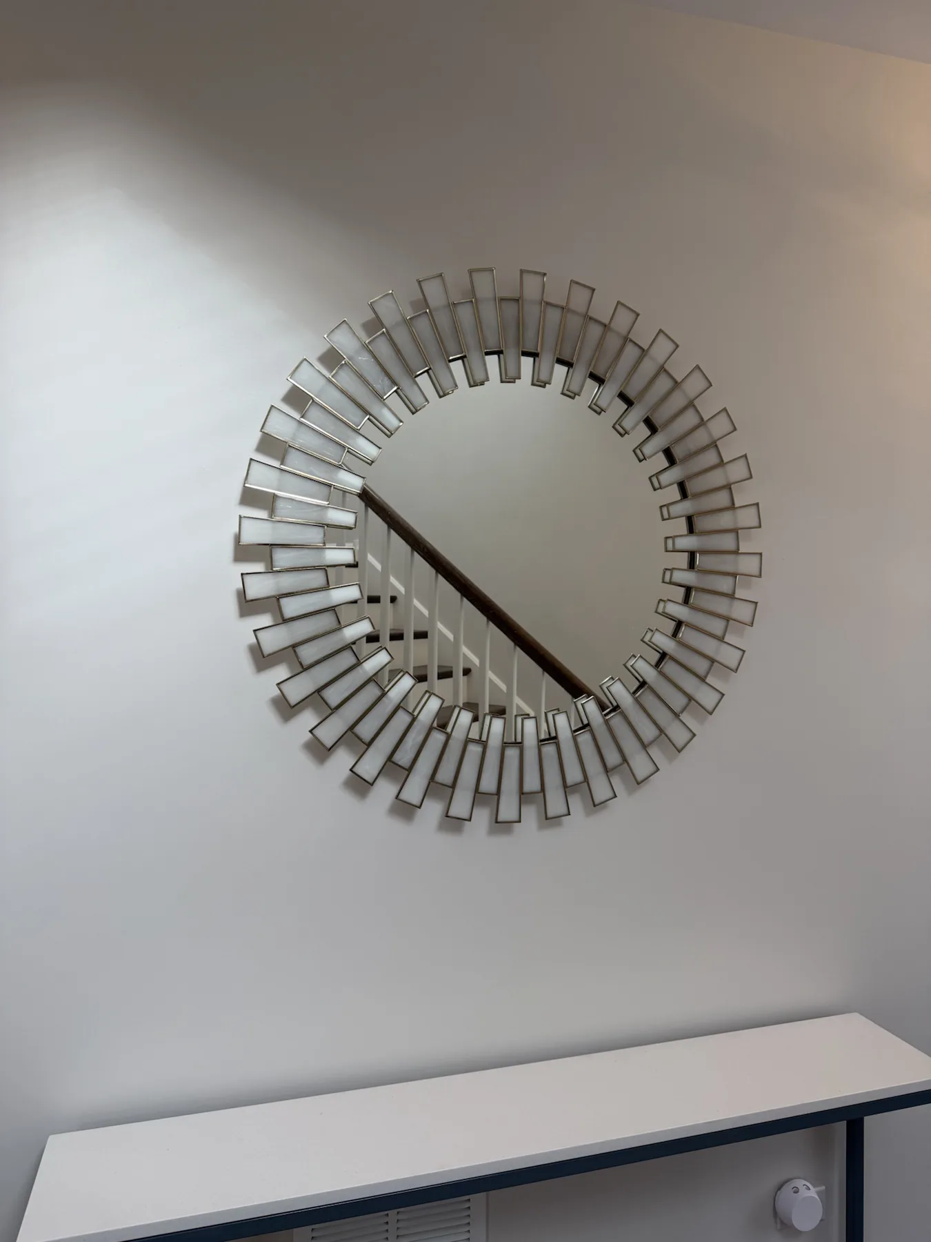 Completed mirror installation by ORLEG Mounting Services