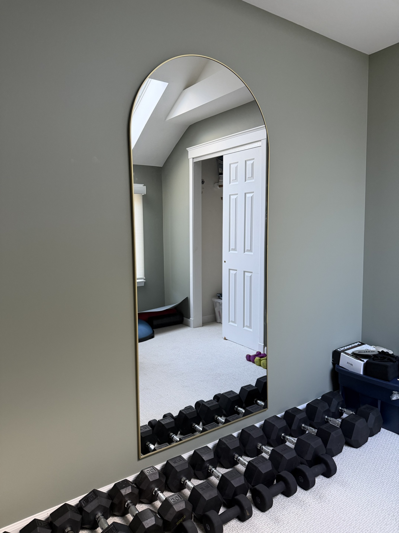 Completed mirror installation by ORLEG Mounting Services