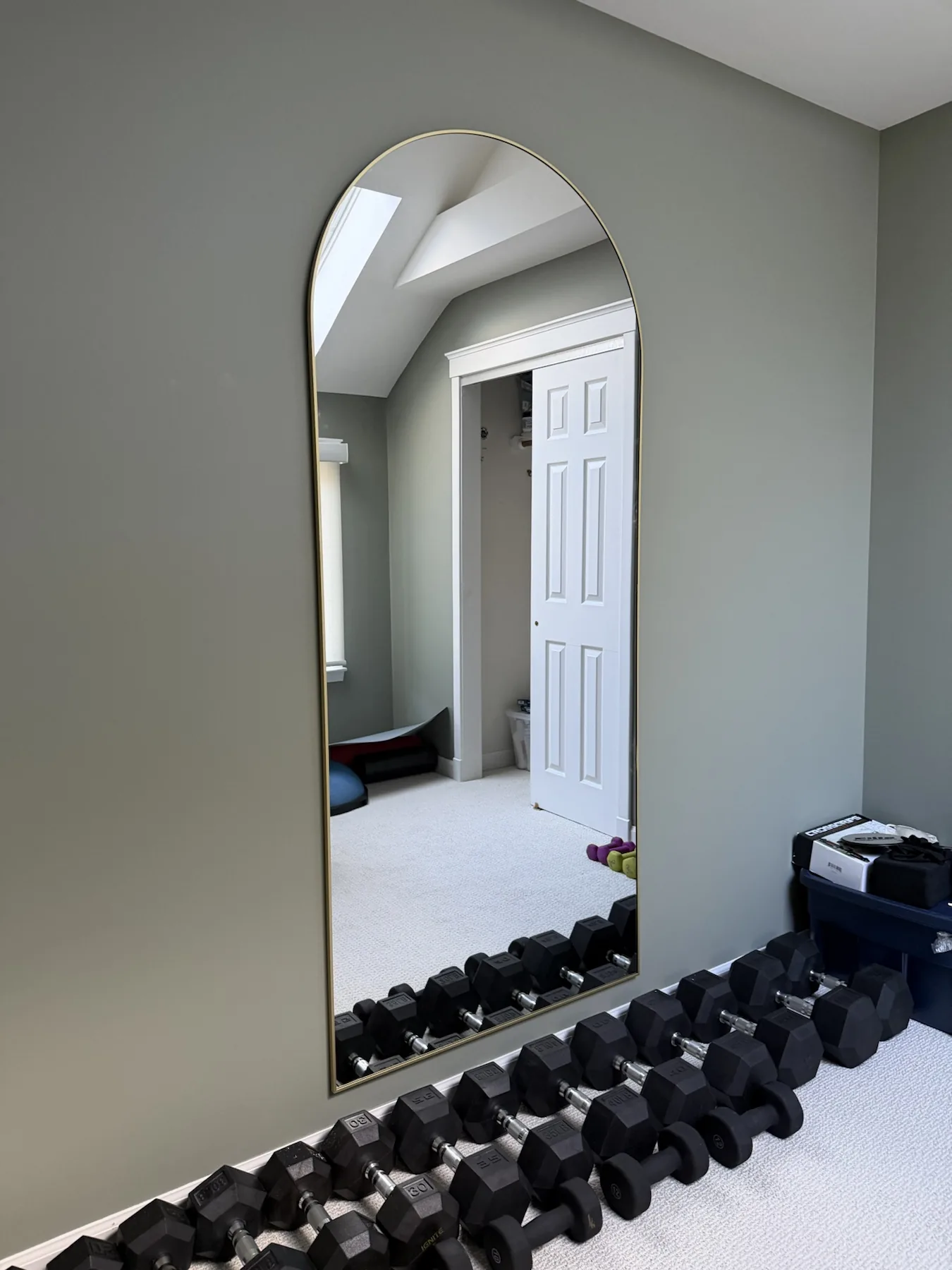 Completed mirror installation by ORLEG Mounting Services