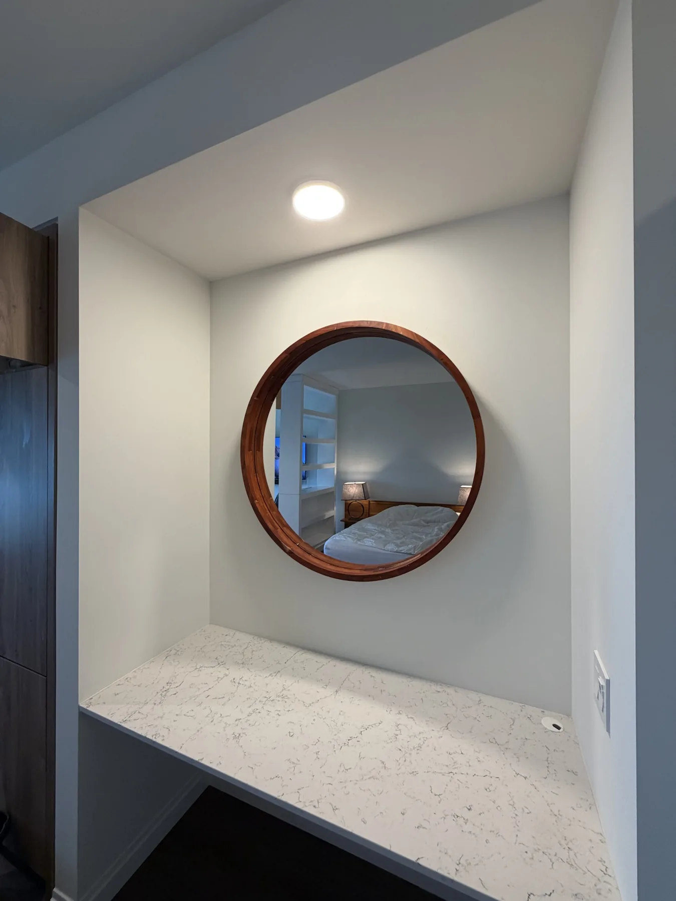 Completed mirror installation by ORLEG Mounting Services