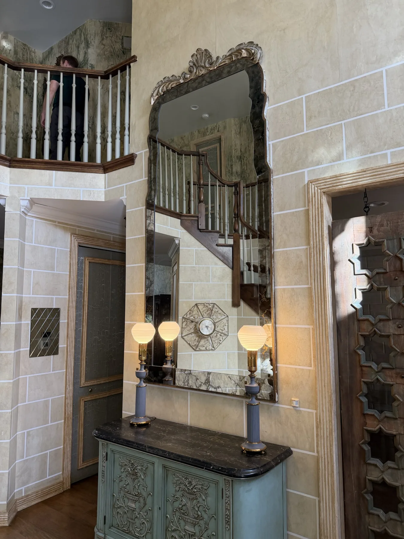 Completed mirror installation by ORLEG Mounting Services