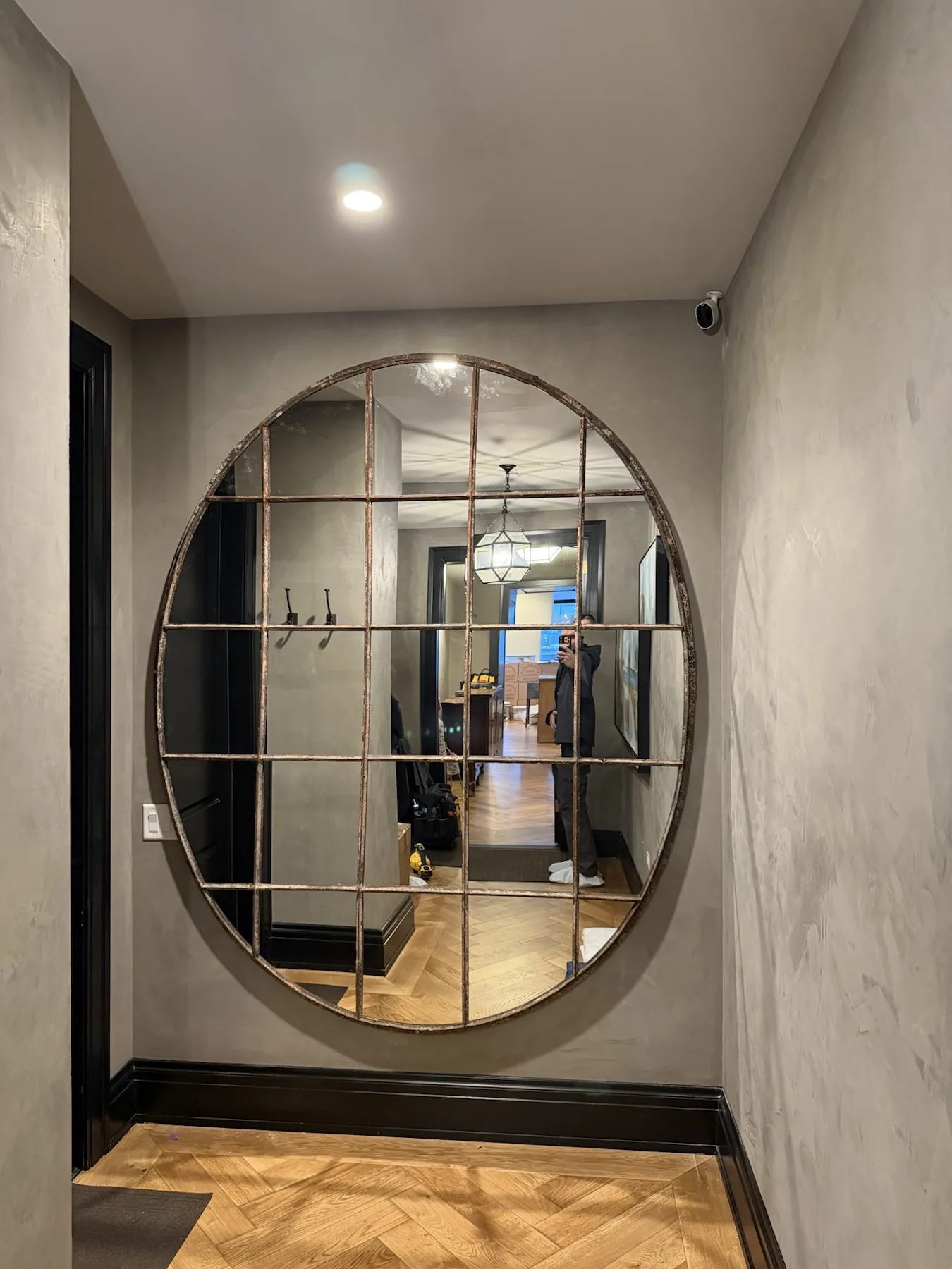 Completed mirror installation by ORLEG Mounting Services