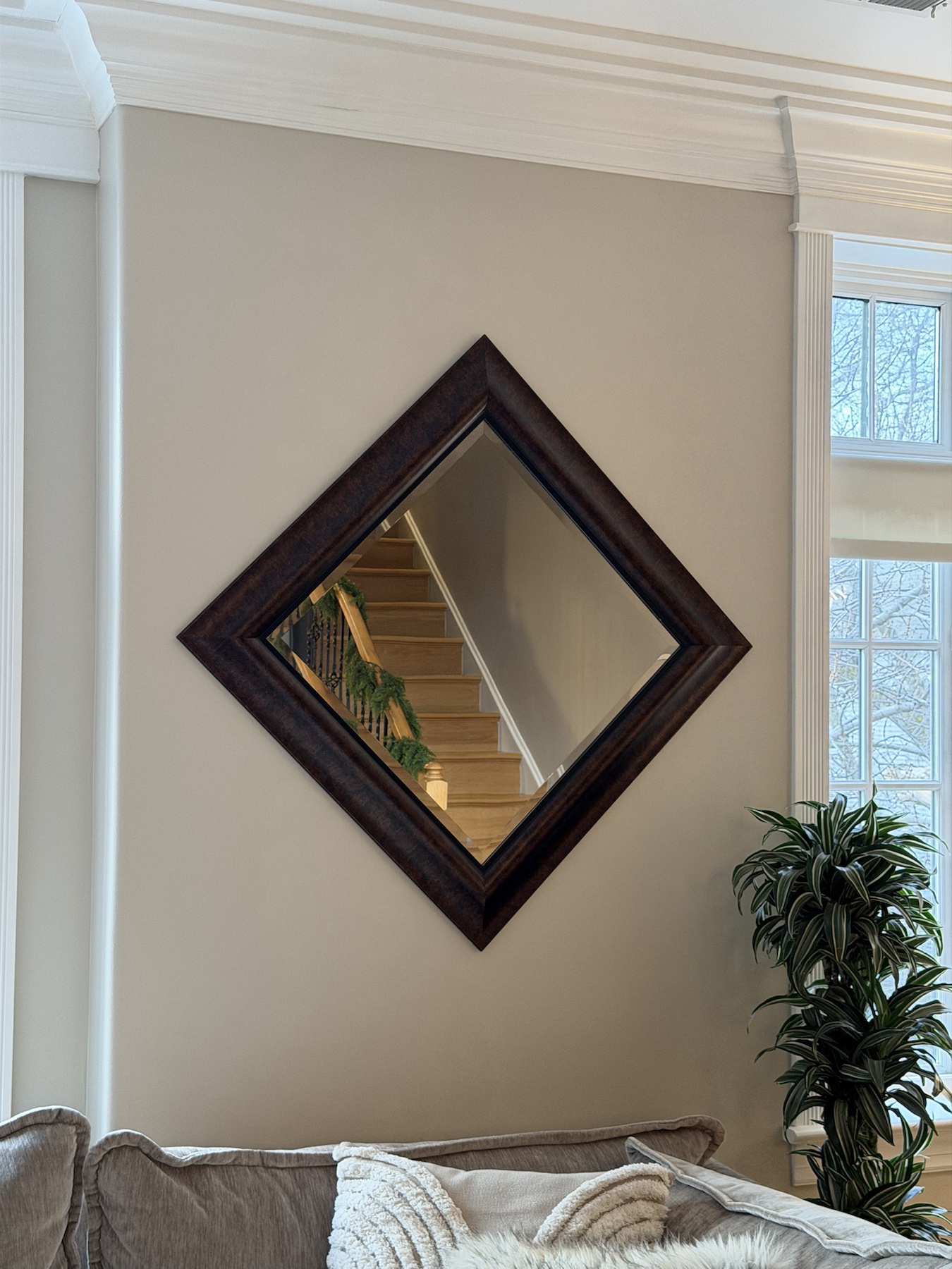 Completed mirror installation by ORLEG Mounting Services