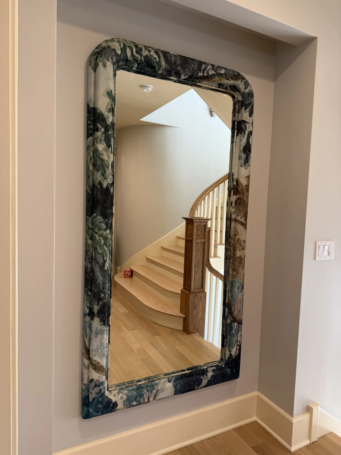 Completed mirror installation by ORLEG Mounting Services