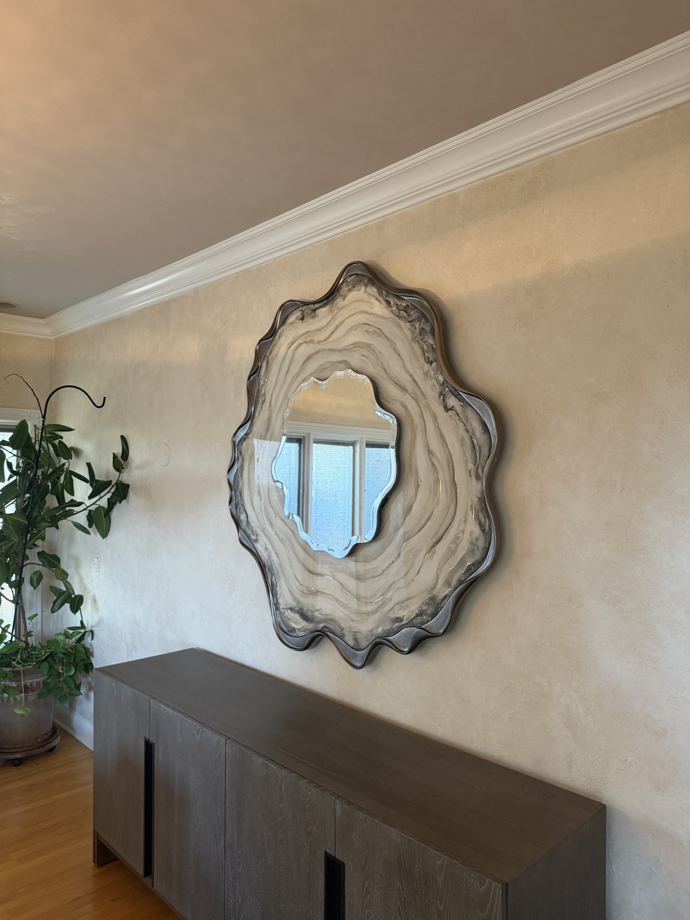 Completed mirror installation by ORLEG Mounting Services
