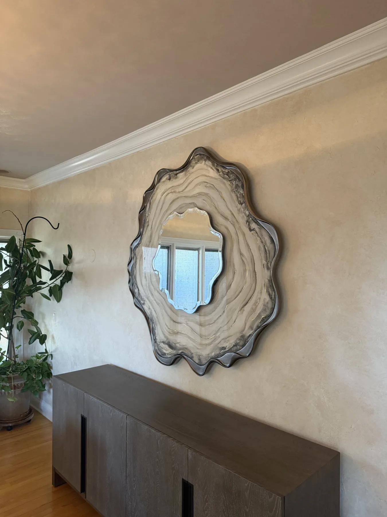 Completed mirror installation by ORLEG Mounting Services