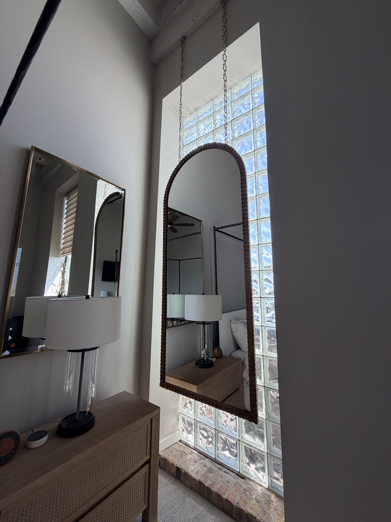Completed mirror installation by ORLEG Mounting Services