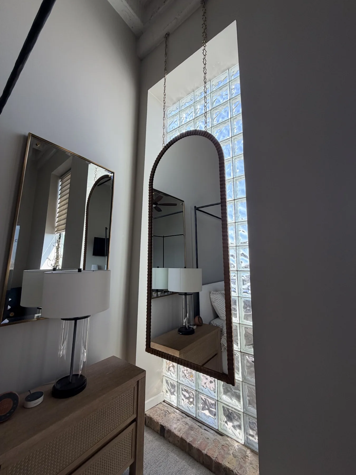 Completed mirror installation by ORLEG Mounting Services