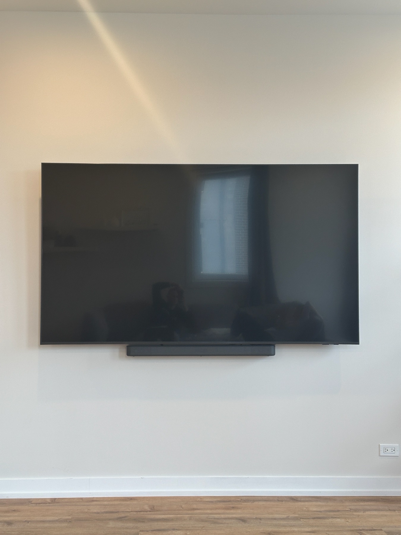 Completed TV installation by ORLEG Mounting Services