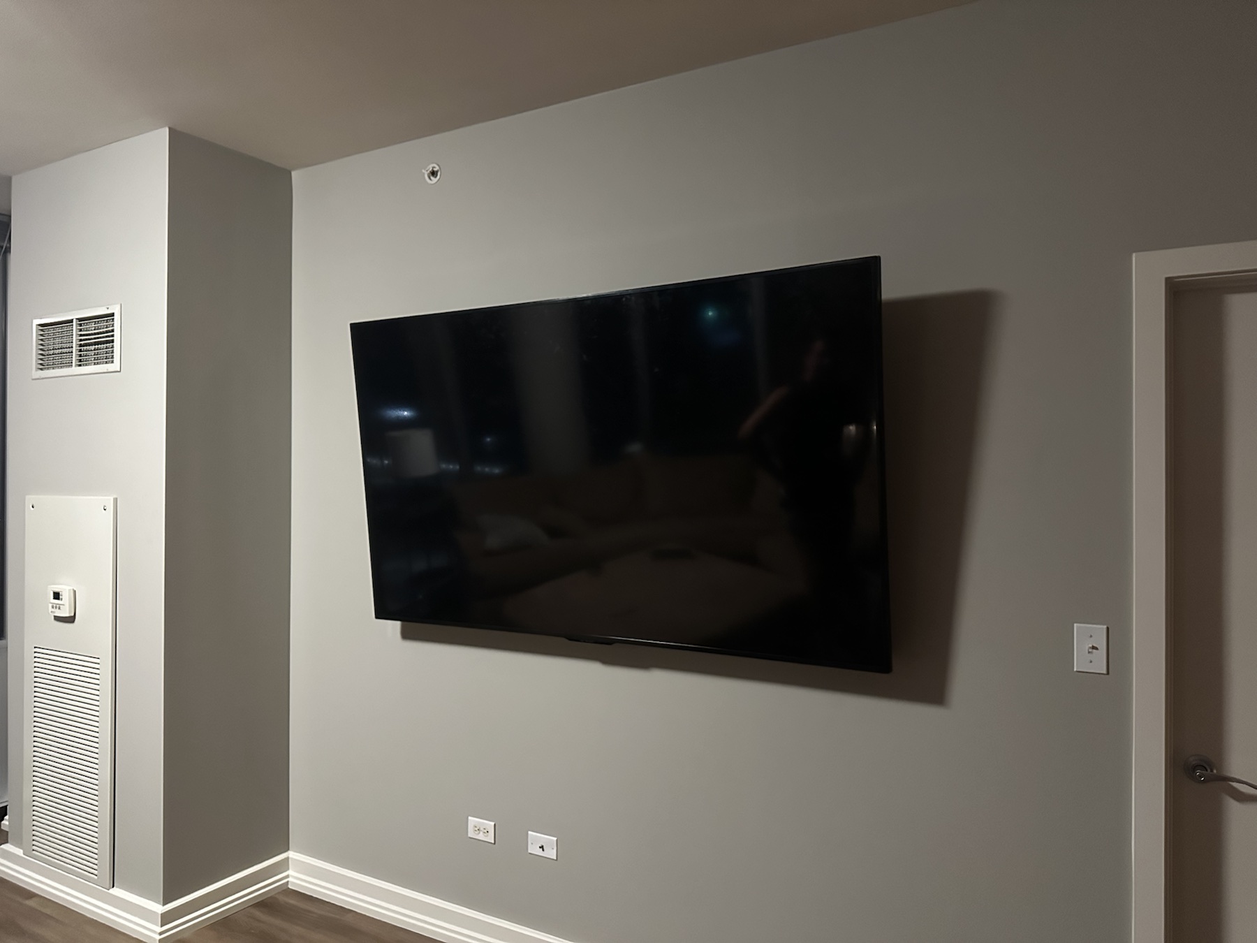 Completed TV installation by ORLEG Mounting Services
