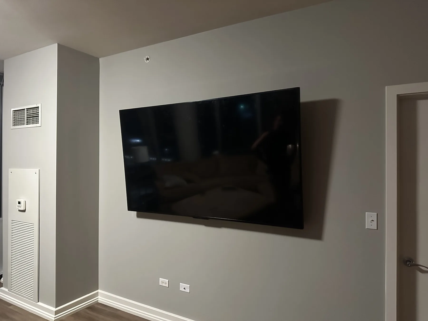 Completed TV installation by ORLEG Mounting Services